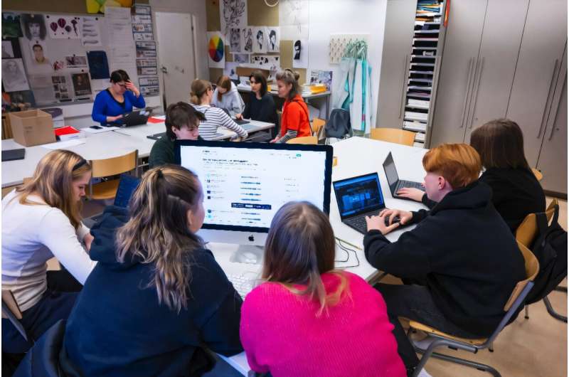 Students attend a class on media literacy at the Hiidenkiven Koulu school in Helsinki